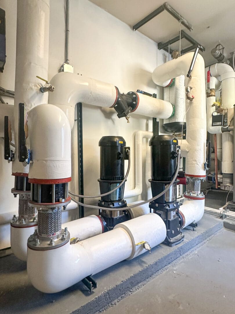 Industrial pipes and valves in a facility.